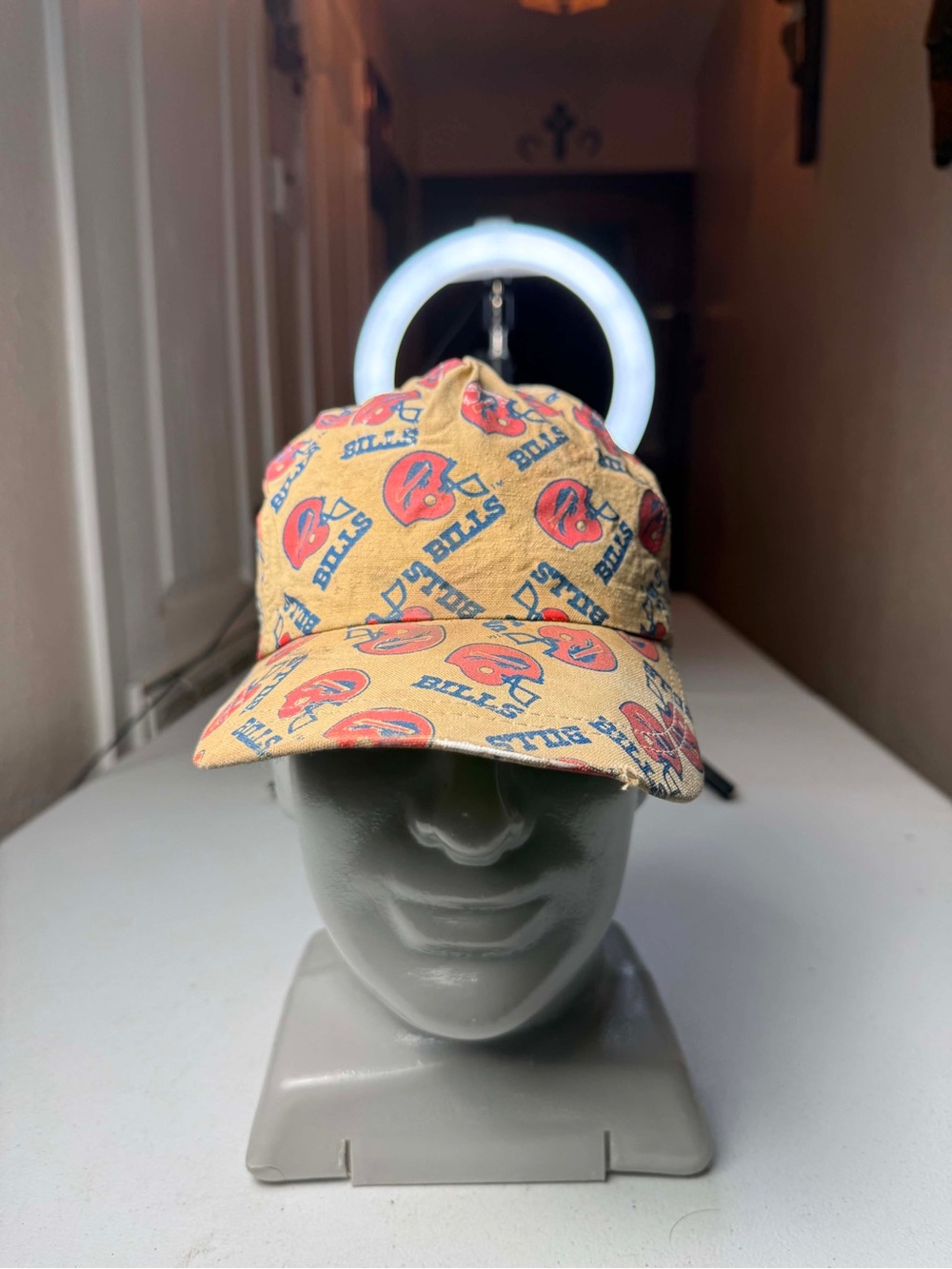 Vintage Buffalo Bills cap with a distinctive tan base and an all over print